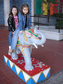Madison and Summer going for an elephant ride.